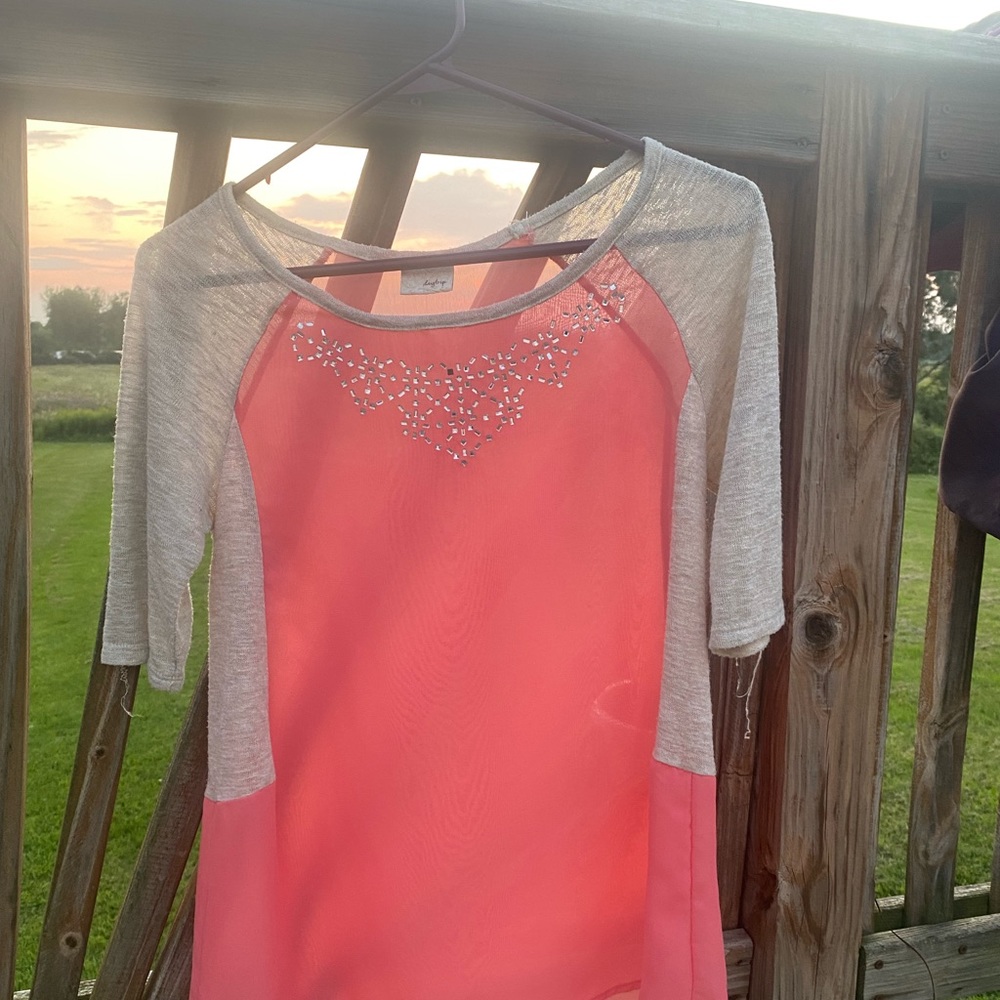 Women’s pink and white dress shirt